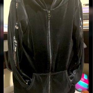 Smooth Black jacket with sequins that change from black to silver on the sleeves